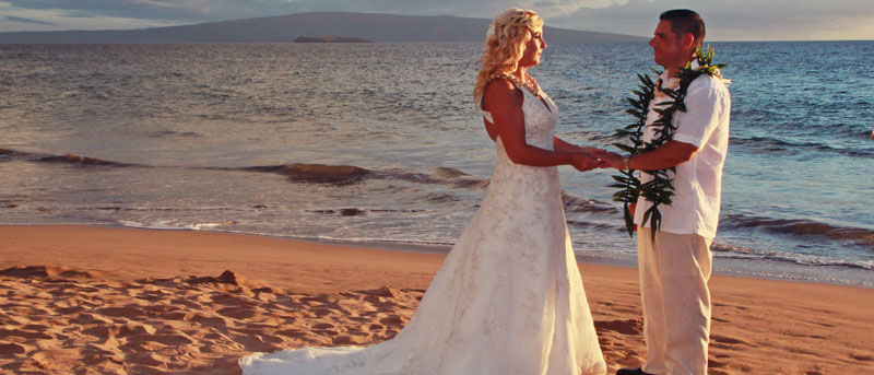 Maui Beach wedding at sunset with Kahoolawe and Molokini in the background.