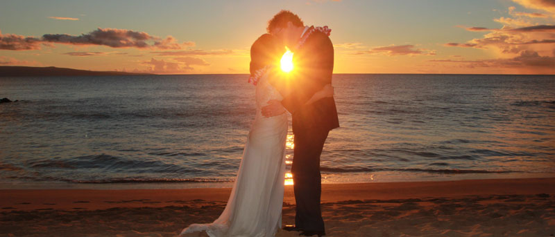 Perfect sunset wedding photograph on Maui beach.